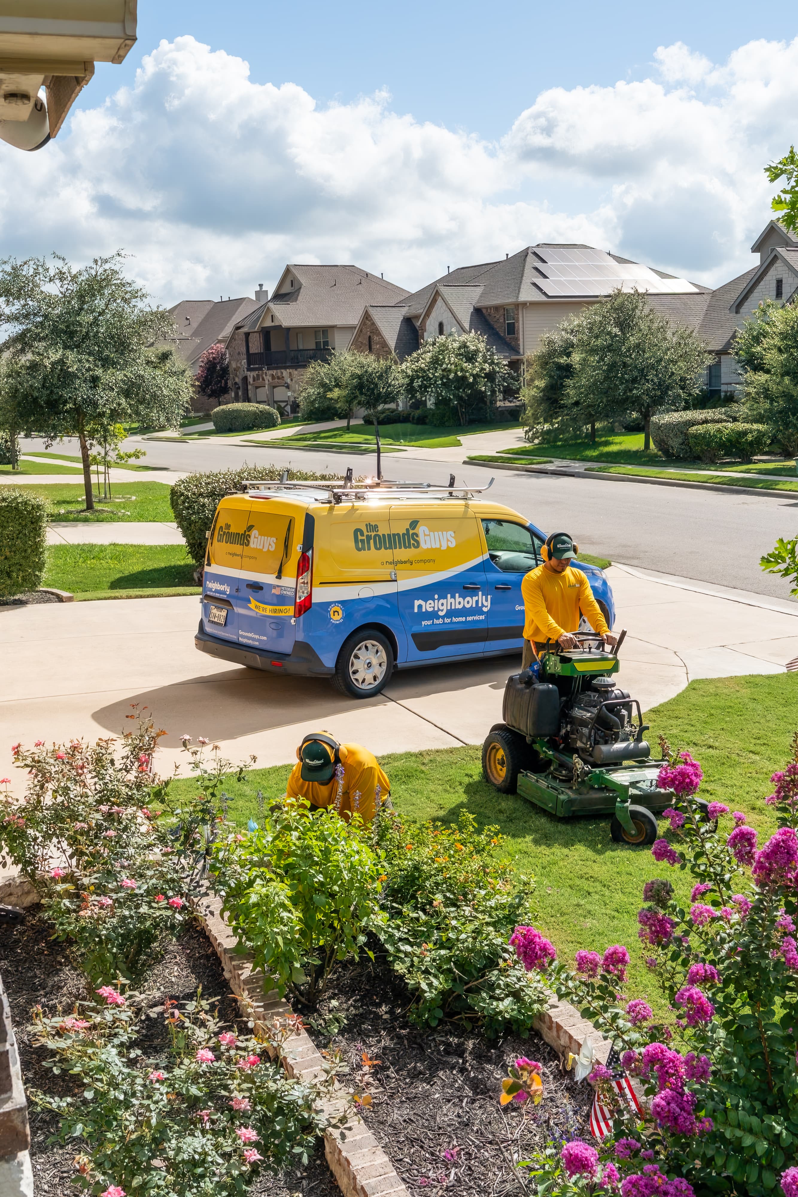 Grounds Guys maintenance crew at a customers house.