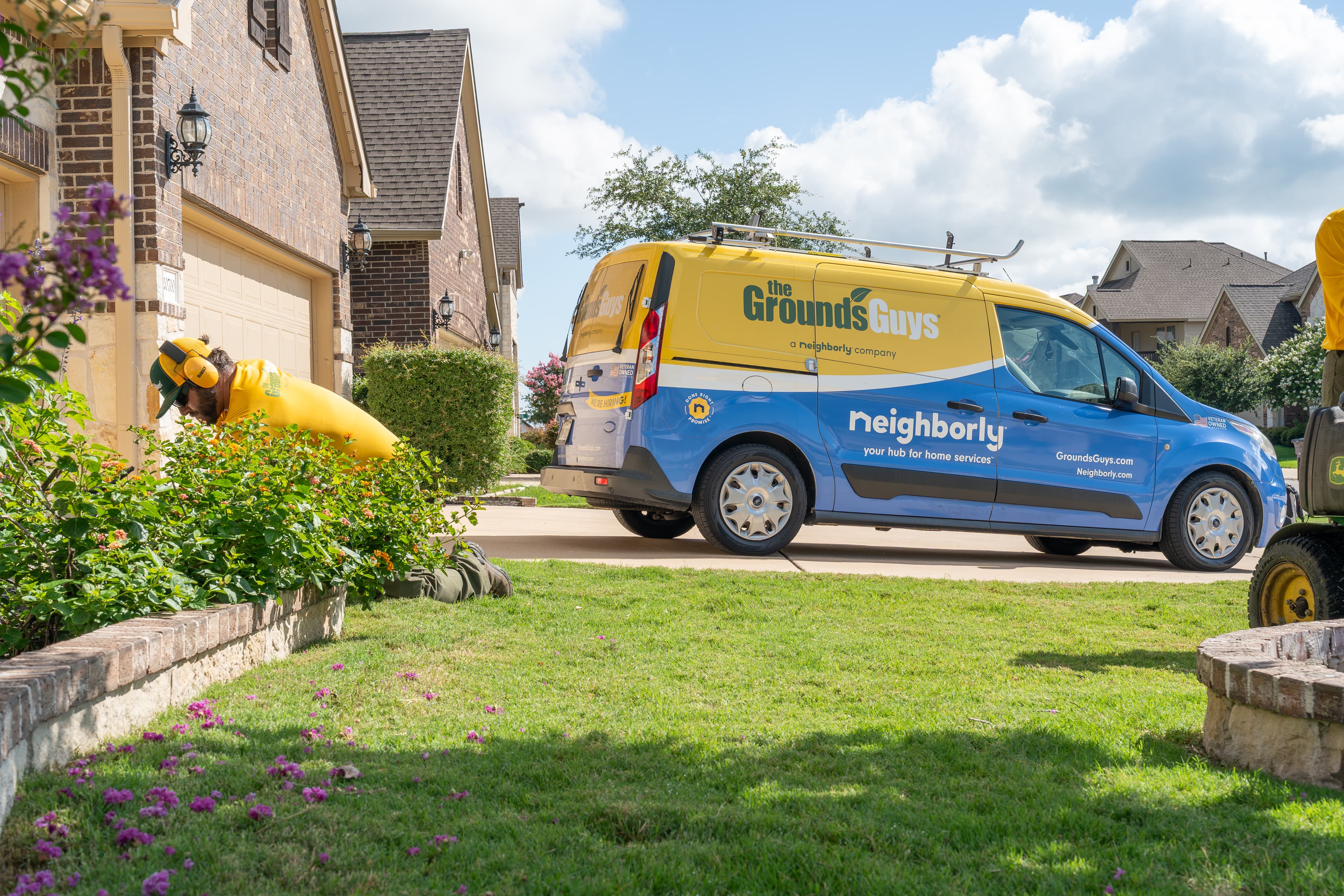 Grounds Guys maintenance crew at a customers house.