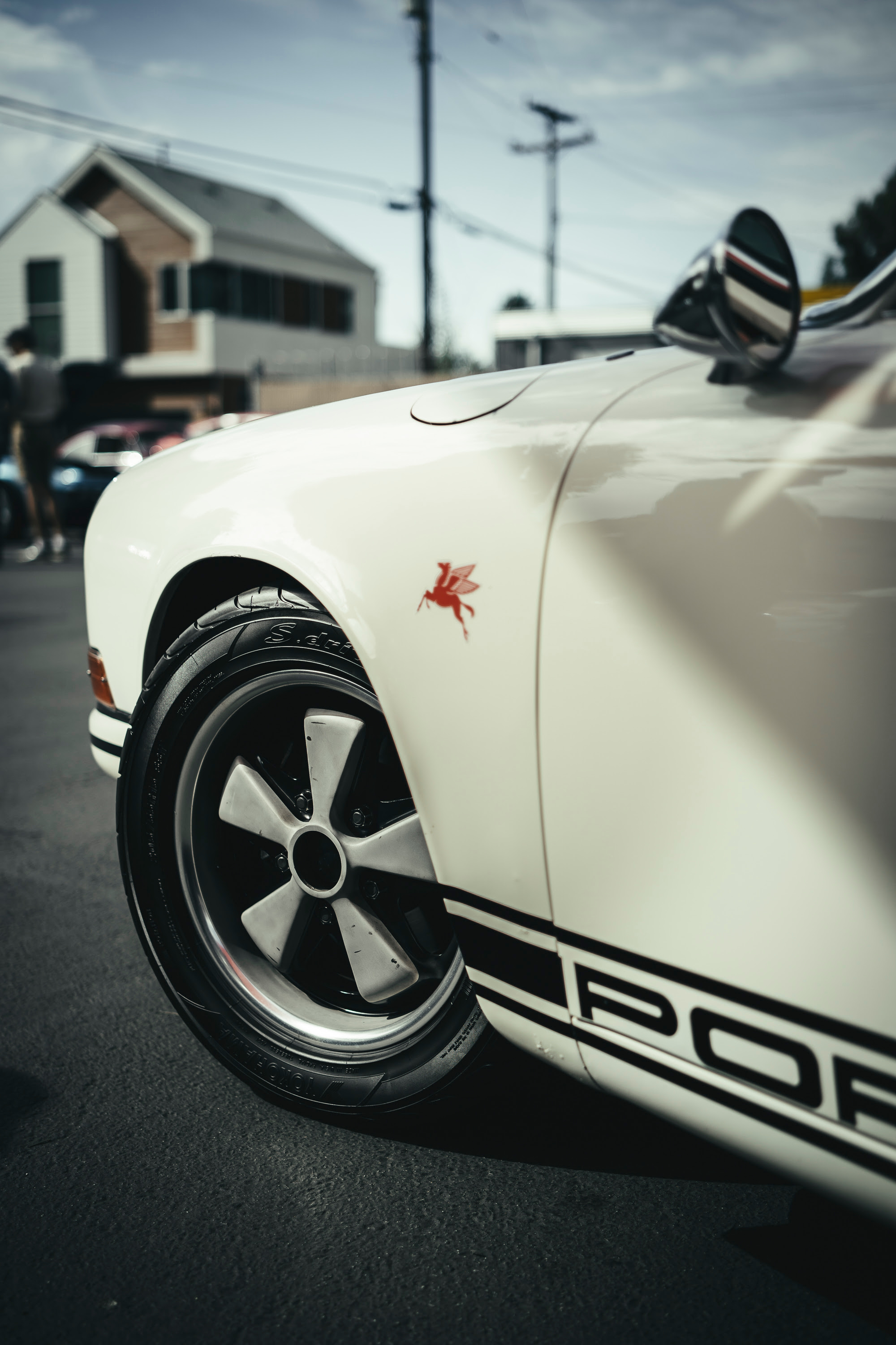 A white 911 at the Auto Kennel open house.