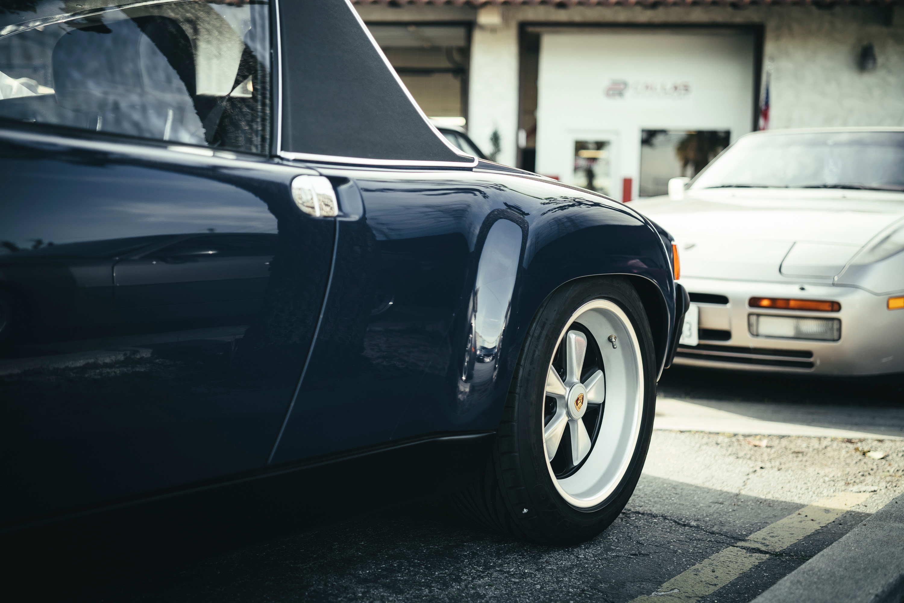 A blue Porsche 914-6 at Callas Rennsport open house.