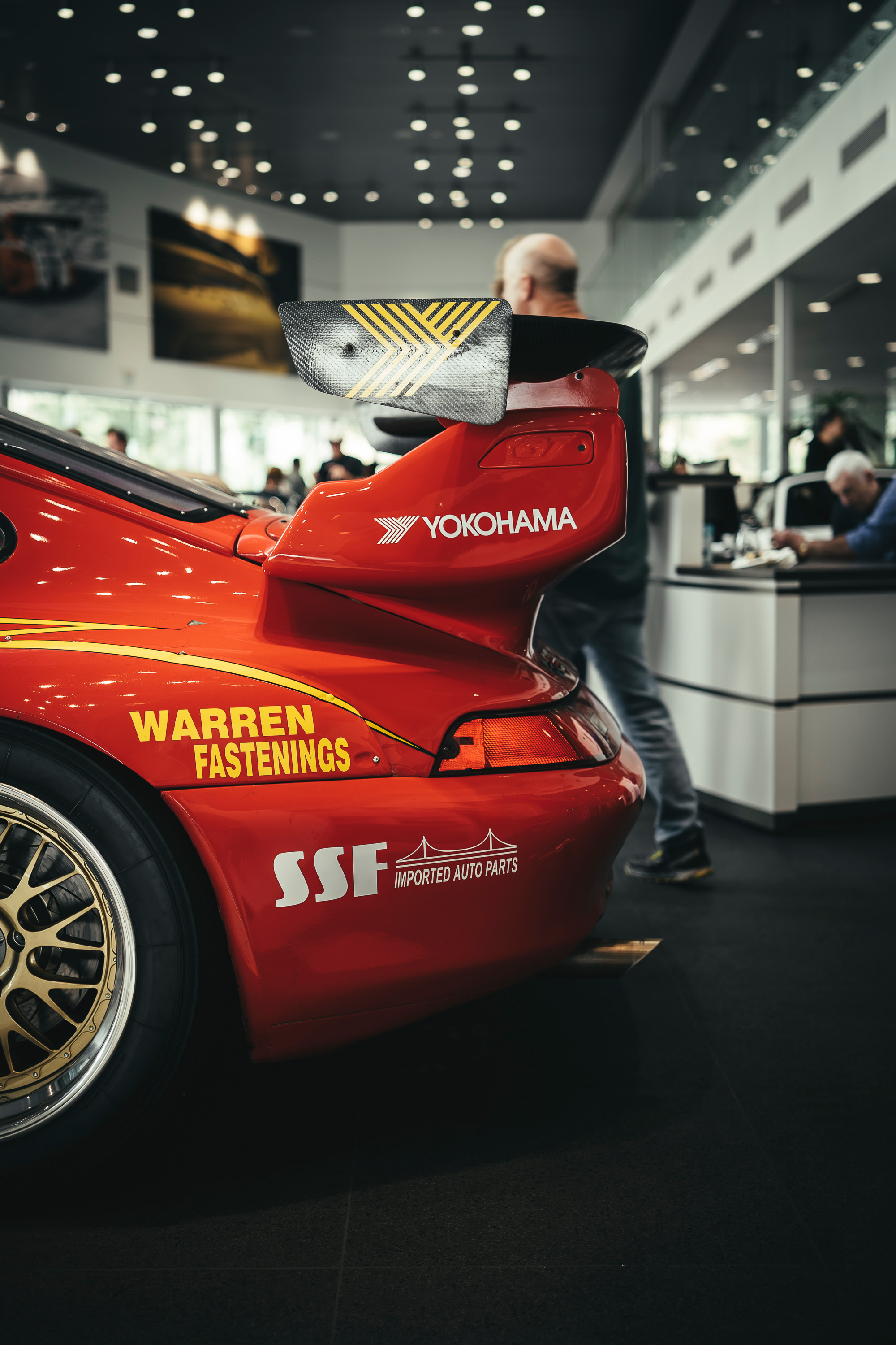 A red 993 GT3 race car at South Bay Porsche.