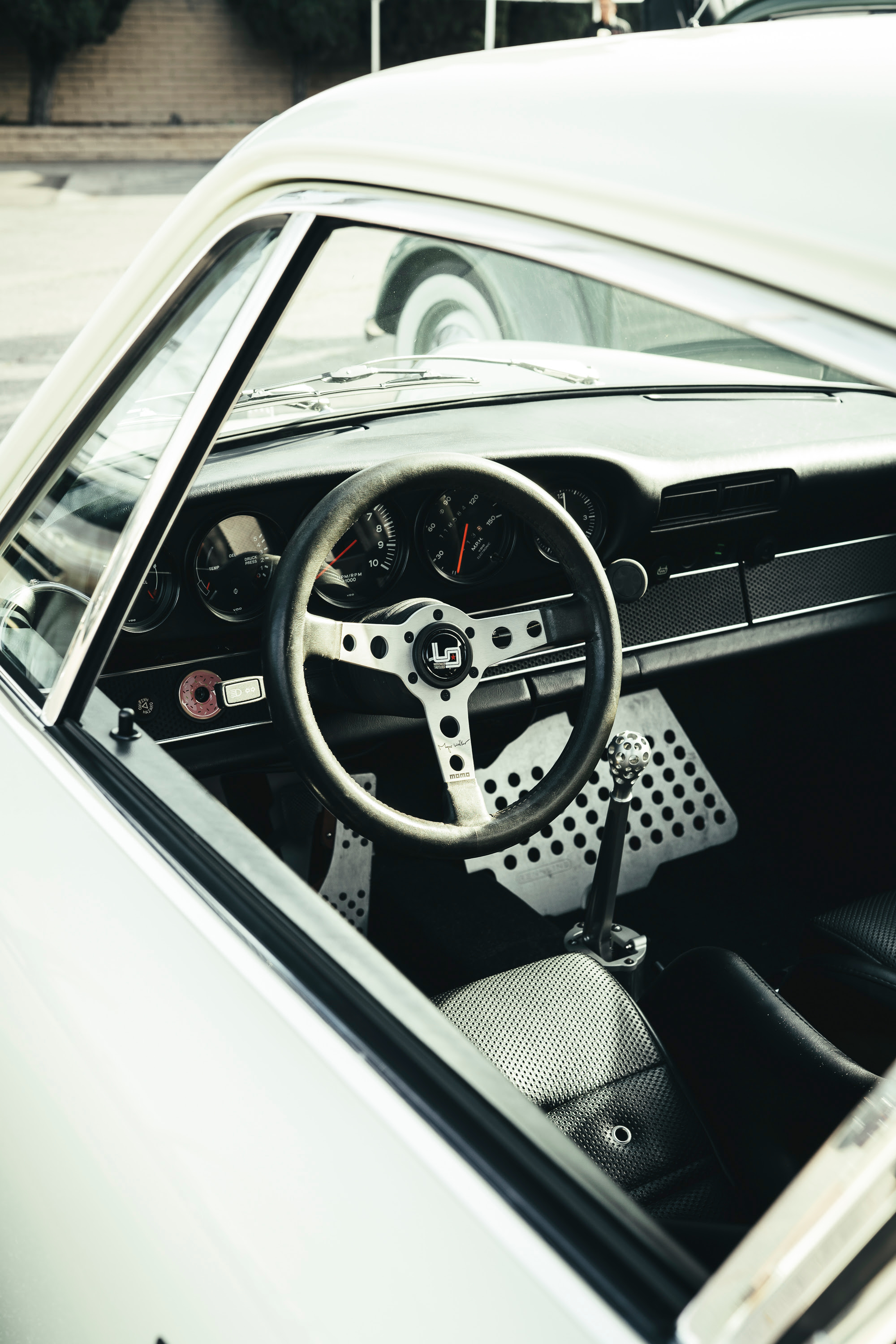 A cream and gold modfied 911 interior at Callas Rennsport.