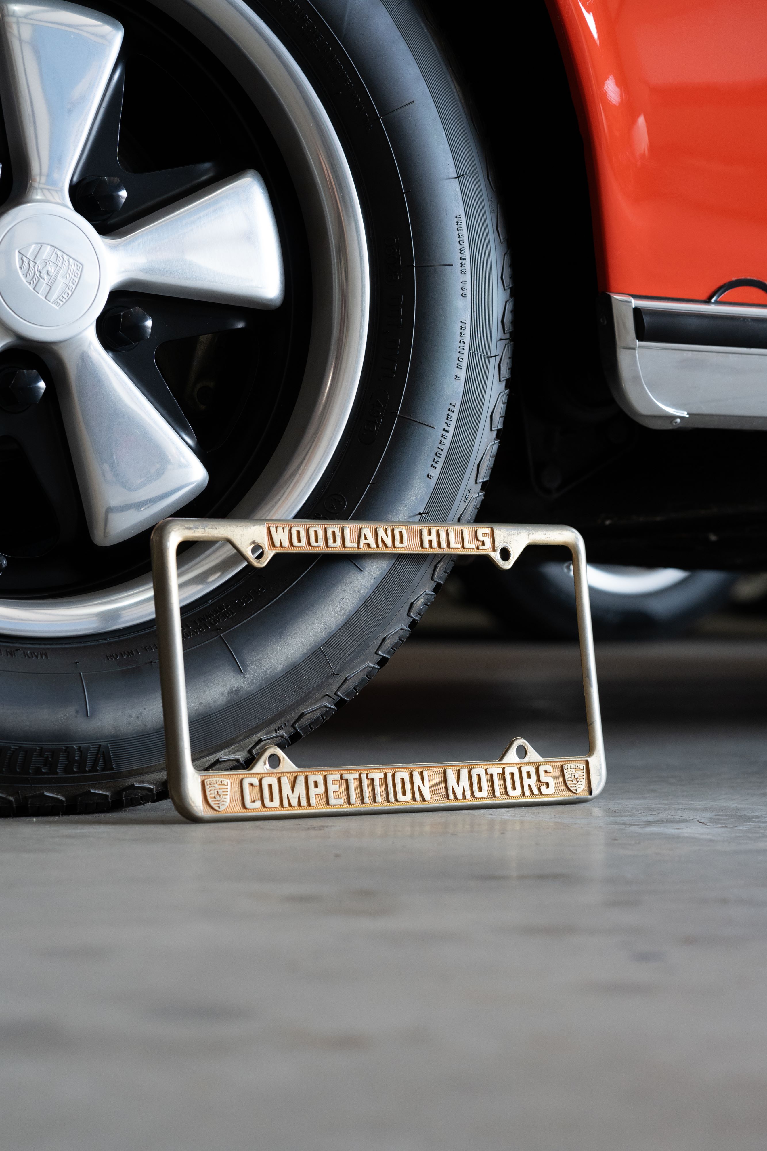 An ultra-rare Competition Motors gold plate frame.