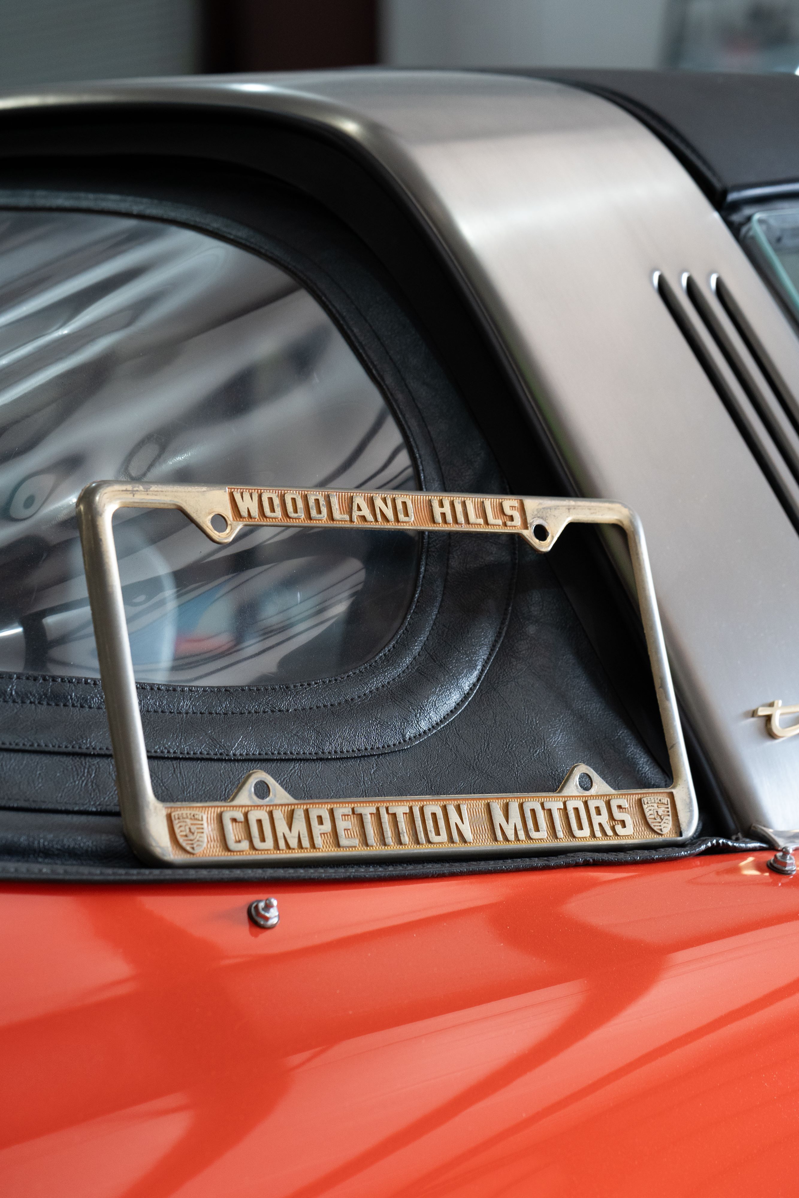 An ultra-rare Competition Motors gold plate frame.