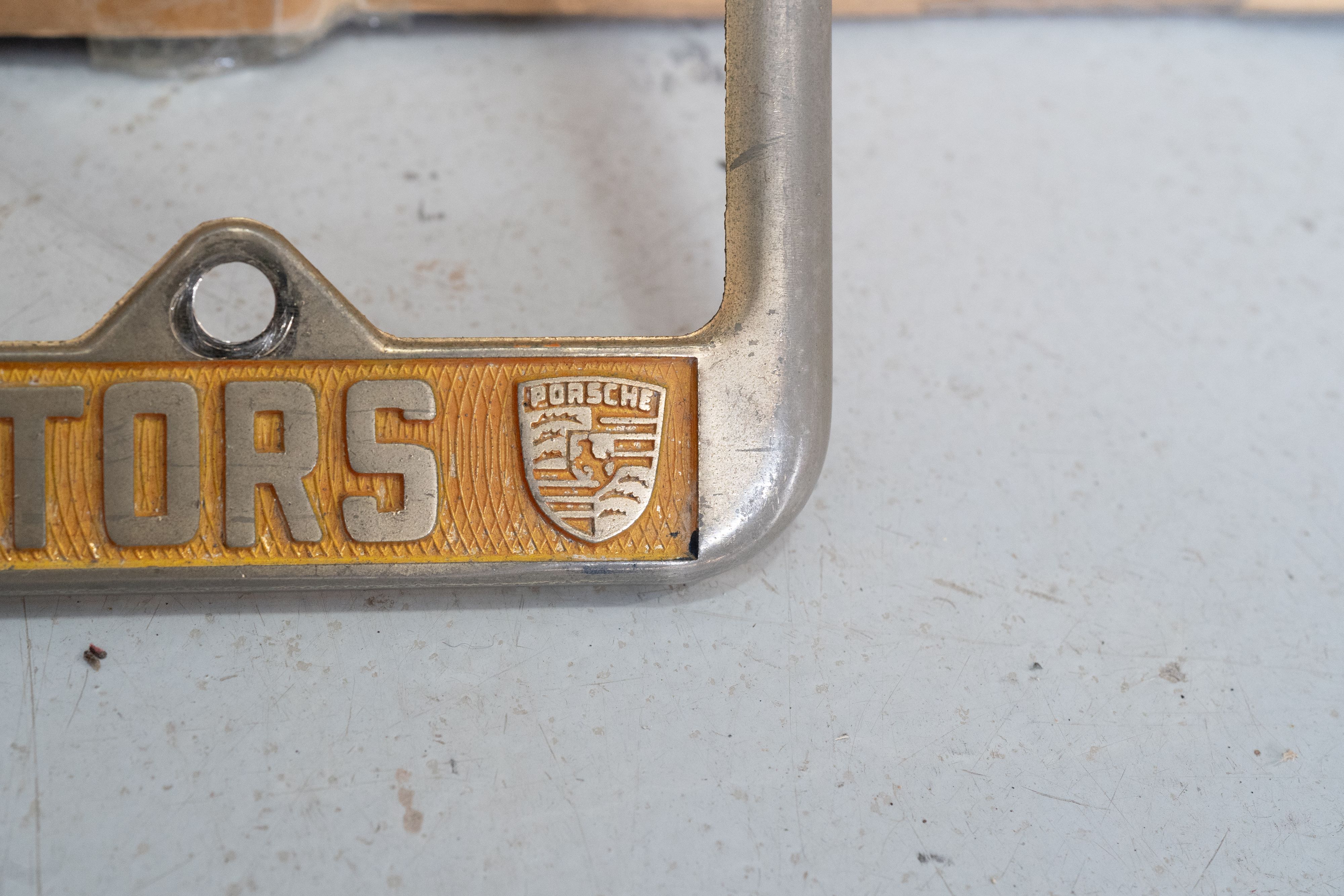 An ultra-rare Competition Motors gold plate frame.