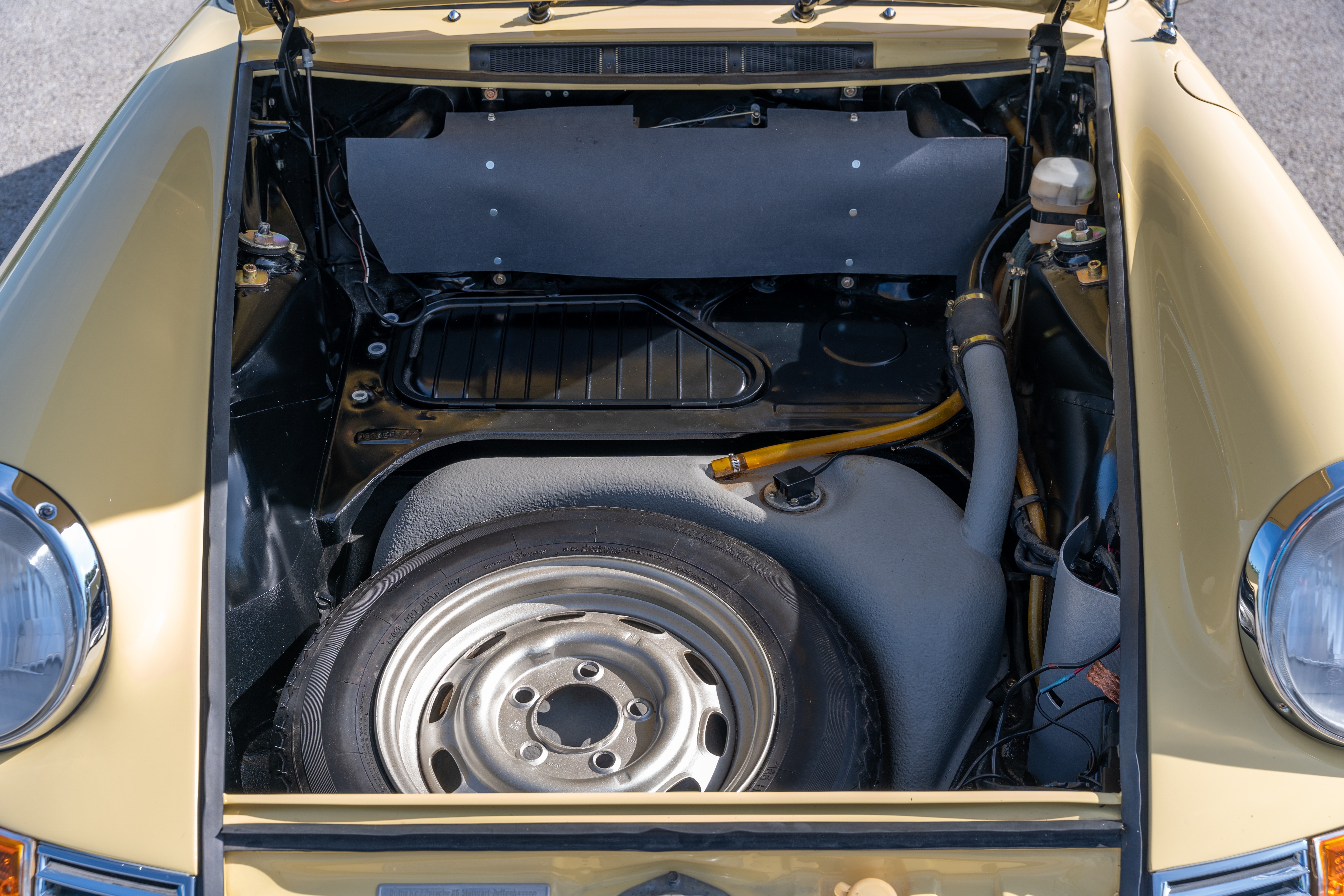 Frunk of a Yellow 1969 Porsche 912 Coupe 5-Speed shot in Austin, TX.