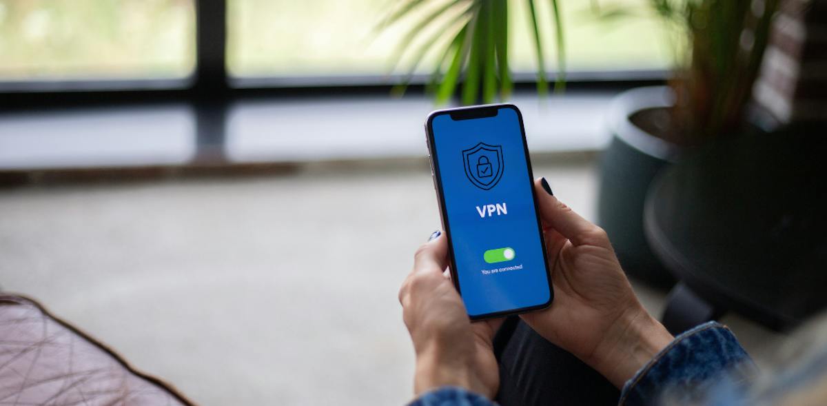 woman connecting to VPN on phone