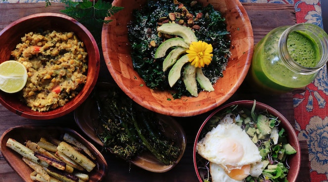 Overhead view of a table full of healthy dishes