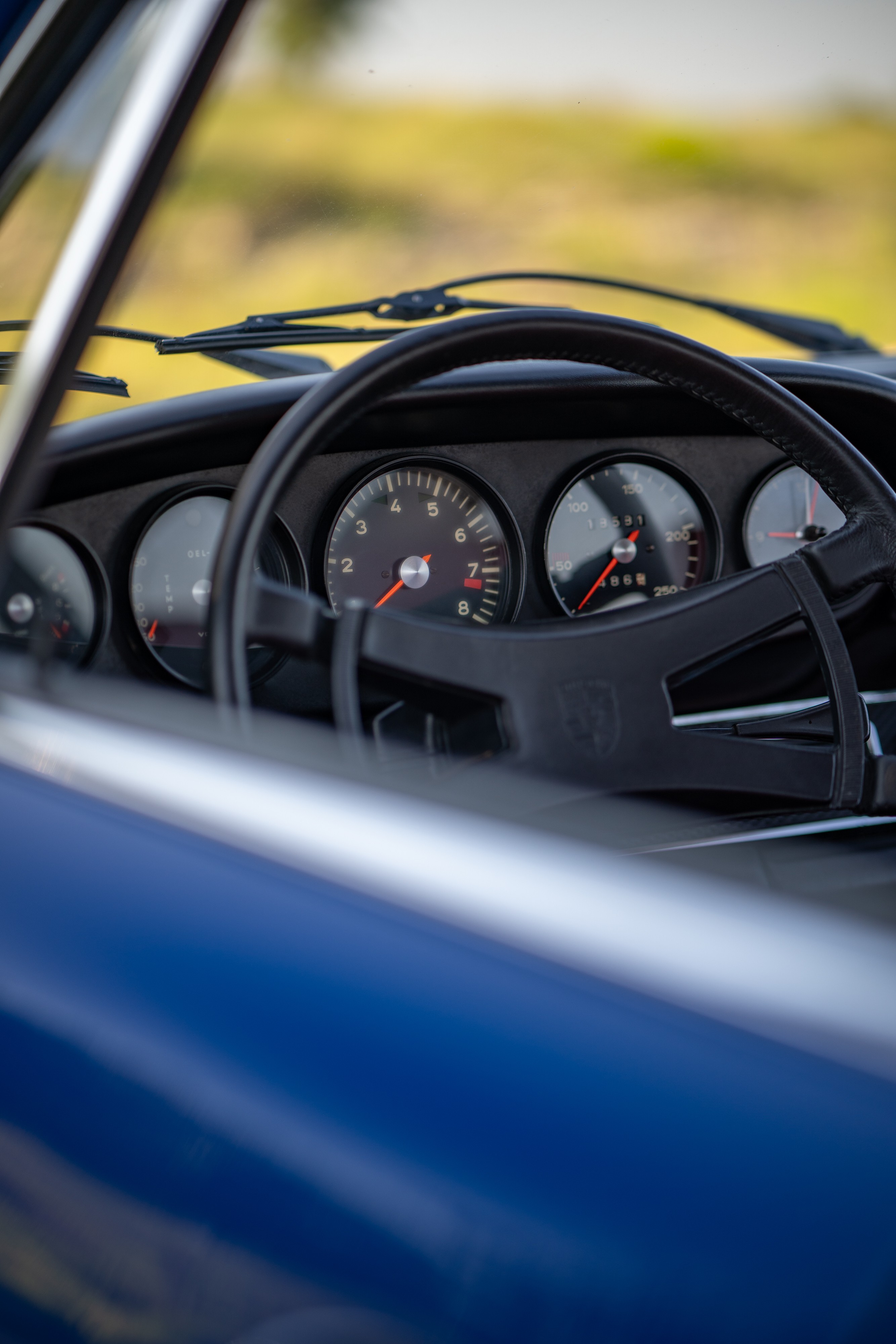 Gagues on a 1969 Porsche 911S in Ossi Blue over Red.