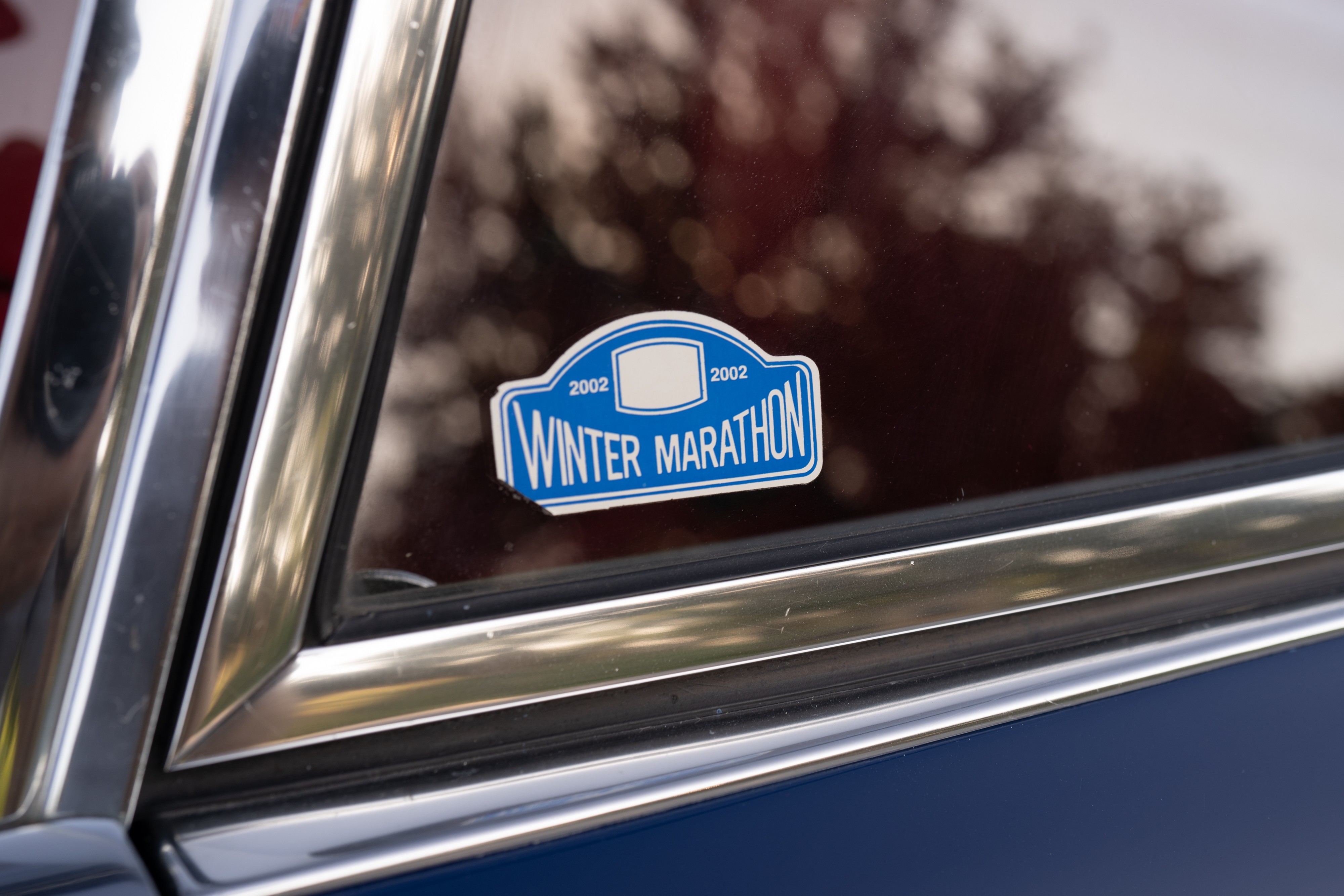 Winter Marathon sticker on a 1969 Porsche 911S in Ossi Blue over Red.