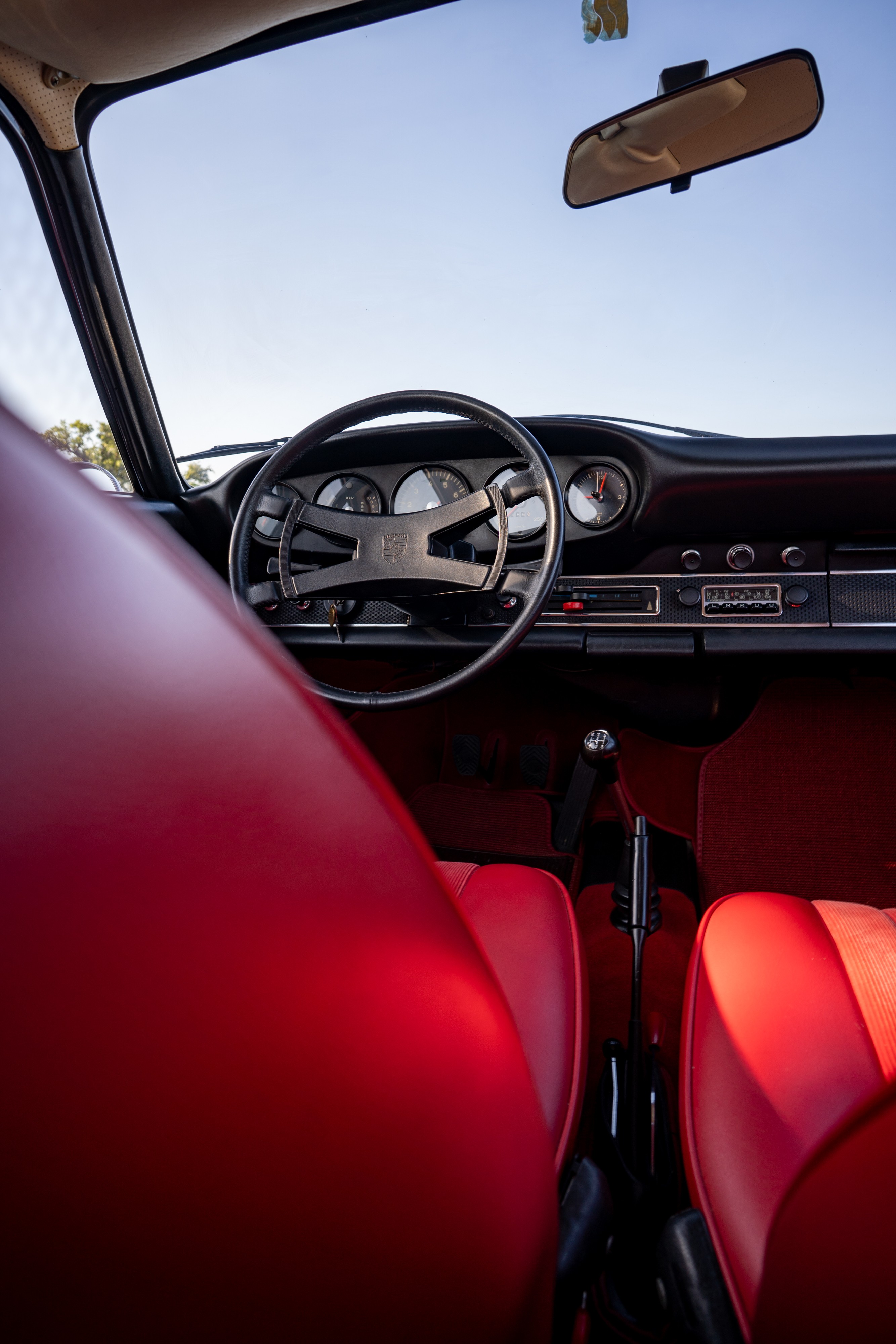 1969 Porsche 911S in Ossi Blue over Red leatherette in Austin, TX.