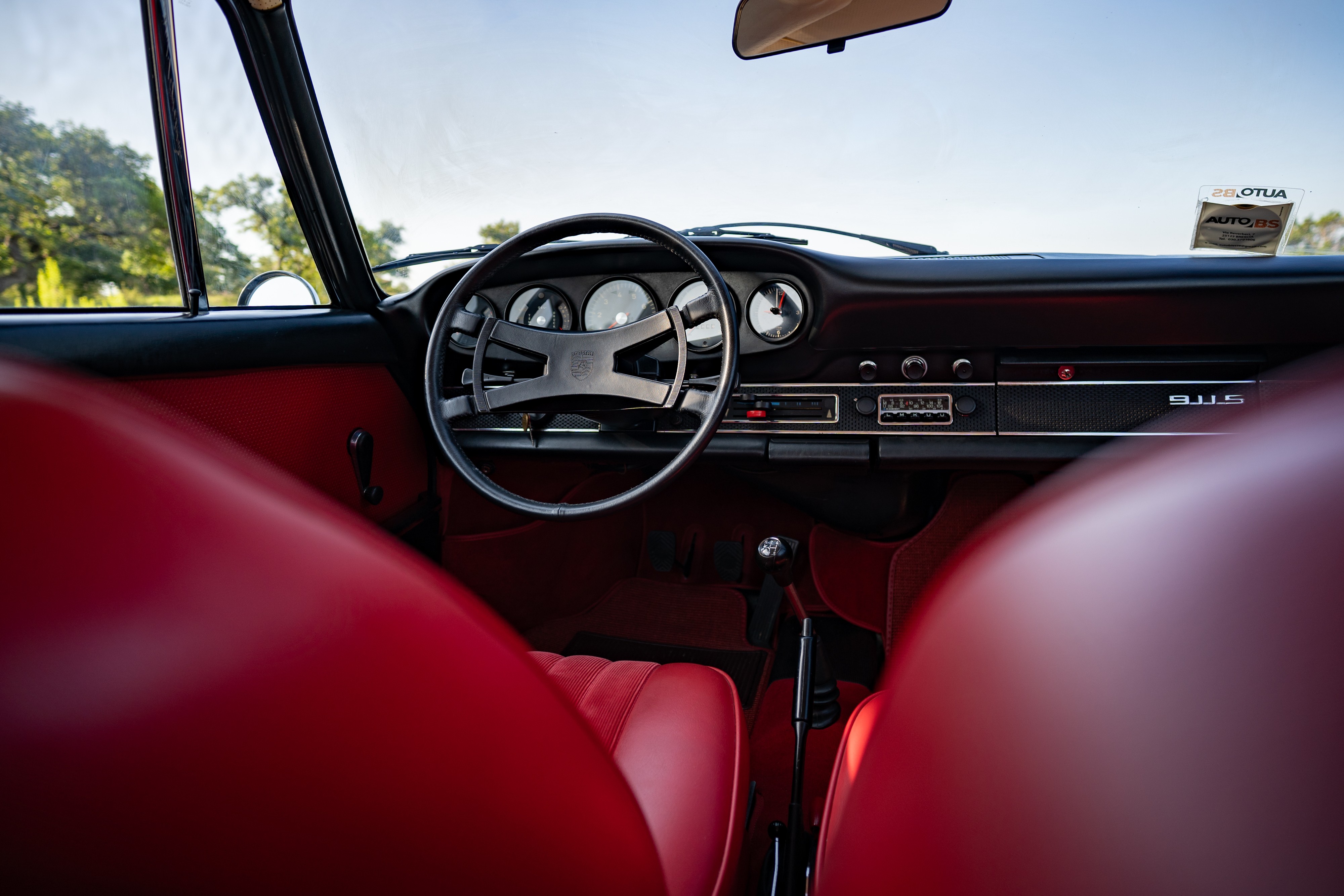 1969 Porsche 911S in Ossi Blue over Red leatherette in Austin, TX.